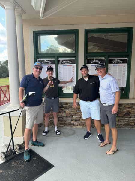 pei golf tourney win with client